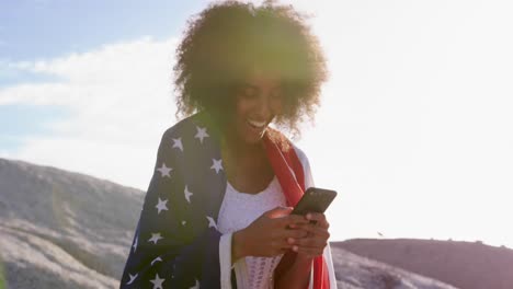 animation of social media icons with numbers over african american woman using smartphone