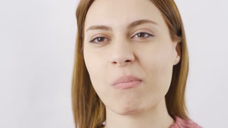 Woman-eating-chocolate-in-close-up.-Eating-chocolate.