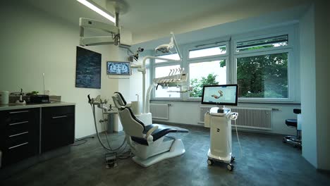 Consultorio-Del-Dentista-Y-Sillón-Dental-En-Medio-De-La-Habitación