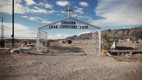 Dollying-in-through-the-gates-of-an-old-desert-cemetery-in-El-Paso-Texas---1882-1970