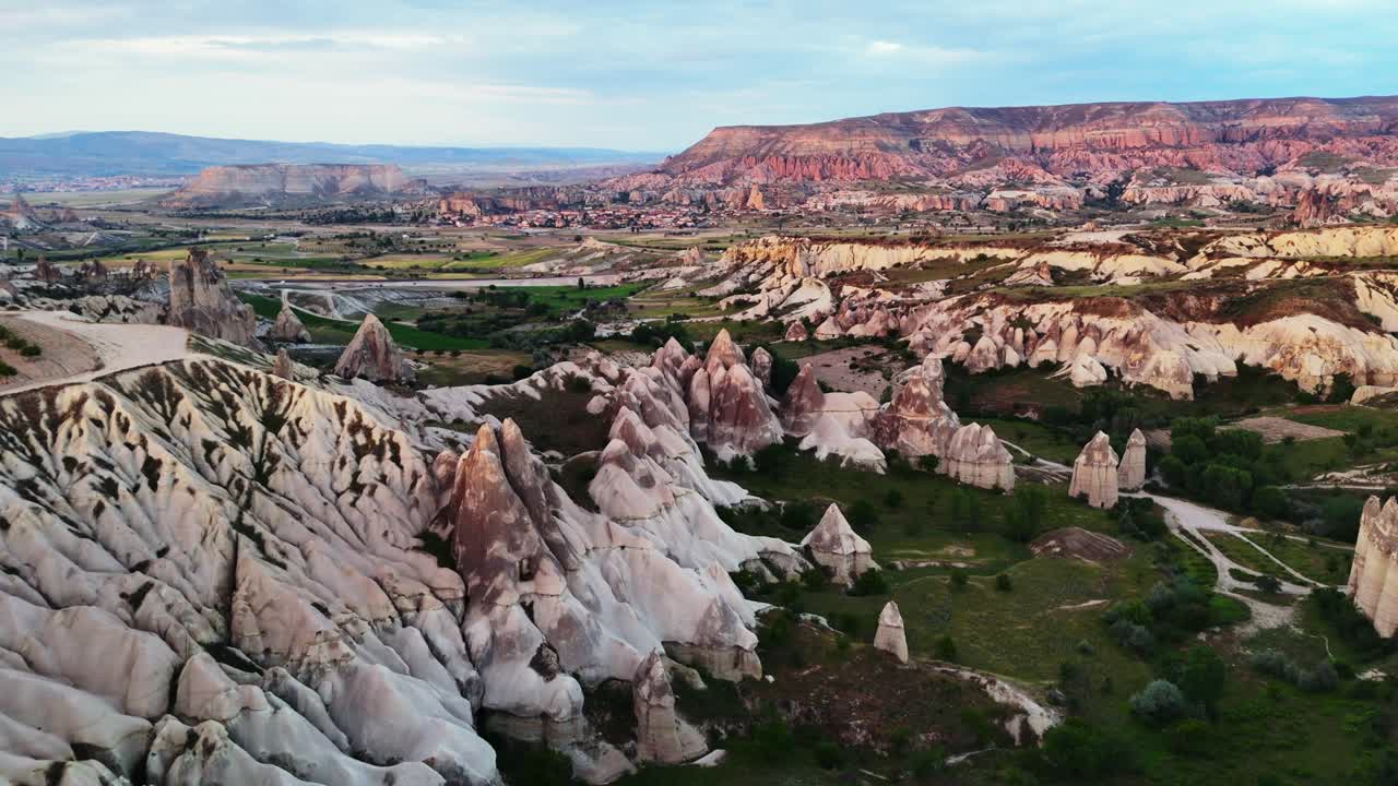 Stunning aerial view of Cappadocia's unique rock formations at sunrise