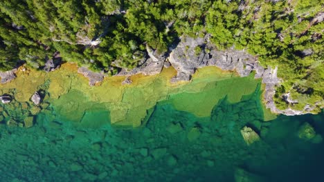 crystal clear lake huron with its rocky shores, ontario, canada