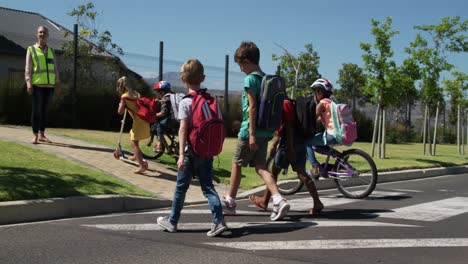 group of kids crossing the road