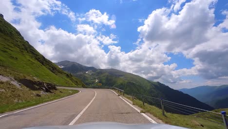 A-Calm-Weekend-Drive-on-the-Majestic-Transfagarasan-Mountain-Highway-with-a-Clear-Blue-Sky-in-Romania