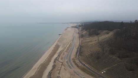 still aerial of beach street, now closed for winter, covered in sand and snow