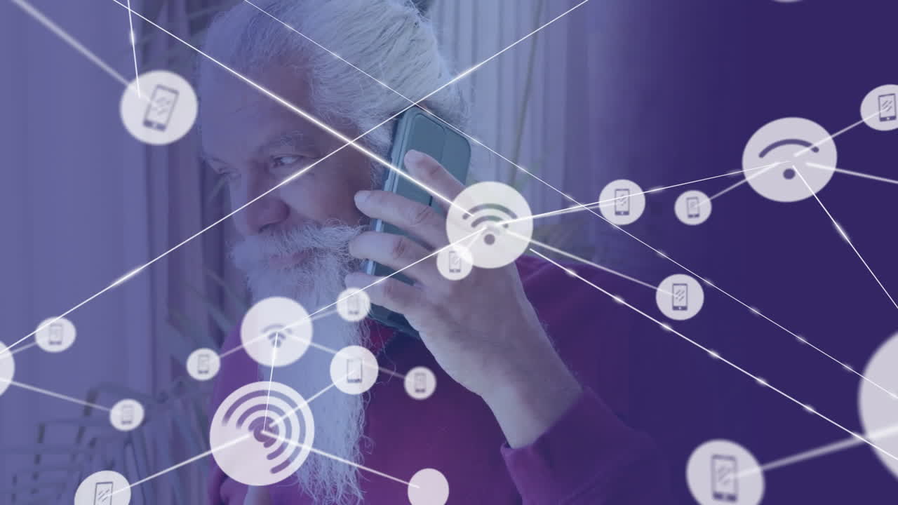 animación de la red de conexiones con iconos sobre el hombre biracial mayor usando teléfono inteligente