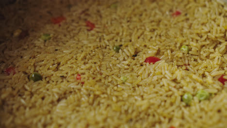 closeup-of-yellow-rice-with-peas-in-a-pot