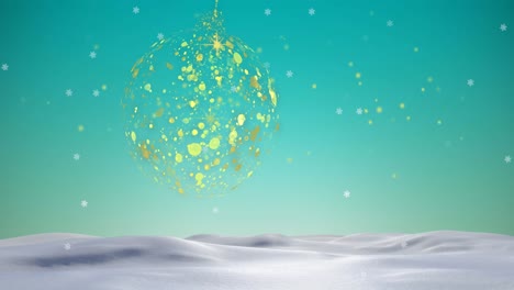 animation of gold christmas bauble swinging over snow falling over blue sky and winter landscape