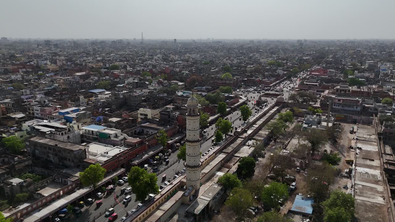High-altitude shot capturing the rugged terrain surrounding Jaipur's ancient fort.