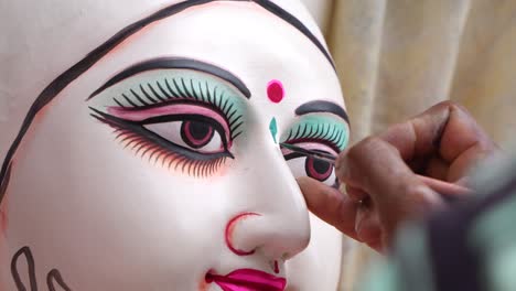 in kumortuli, idol artists are making idols of durga, the revered deity of hinduism. the work of making these idols starts from june and these potters make many idols till november.