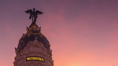 timelapse of  gran via street in madrid, spain.  beautiful sunset  and metropoli building.