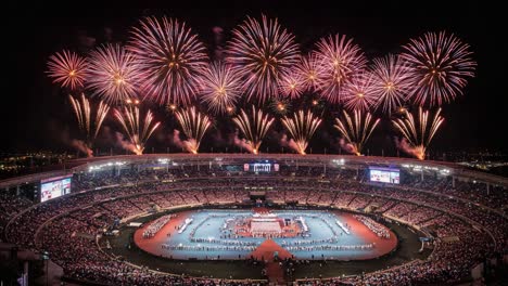 spectacular night sky over stadium: a captivating display of fireworks illuminating the exciting atmosphere of a major sporting event