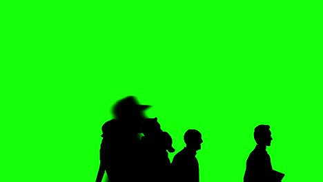 animation of a large crowd crossing (4k video). silhouette version. close-up view. green background for background transparent use