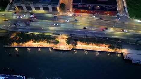 busy highway alongside scenic waterfront east river esplanade