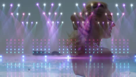 dancing woman with colorful stage lights and reflections in background animation