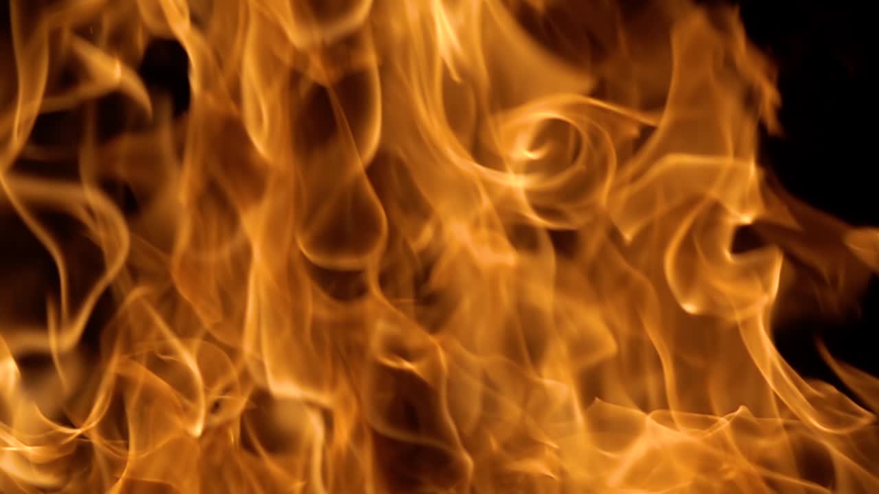 Flames of fire on black background in slow motion