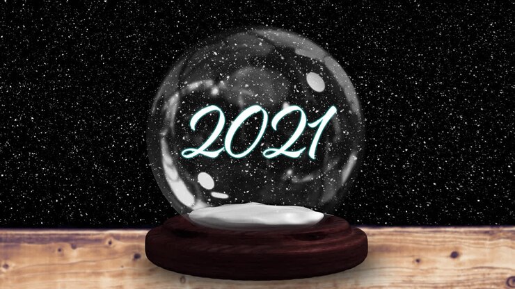 Animazione di neve che cade su una palla di neve con la scritta "2021" su sfondo nero