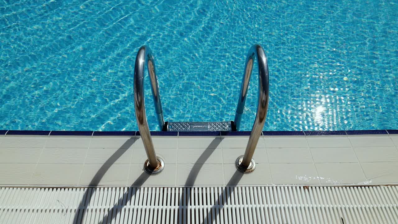 Grab bars ladder in the swimming pool