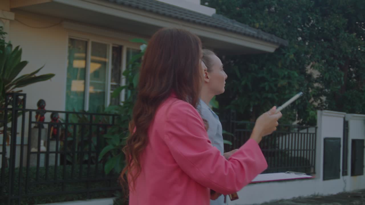 Real Estate Agent Showing Property to Client