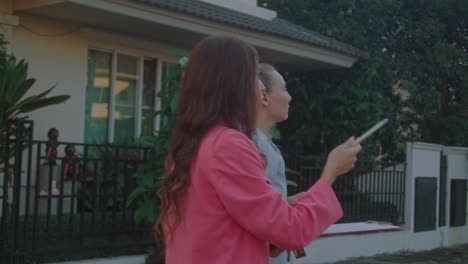 real estate agent showing property to client
