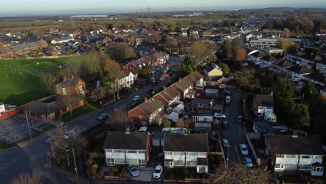 rainhill typical british suburban village in merseyside, england aerial view circling autumn residential council neighbourhood