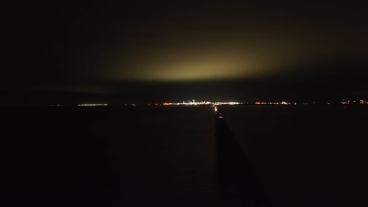 Reverse over bridge into darkness