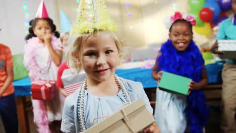 animation of confetti falling over kids with birthday presents
