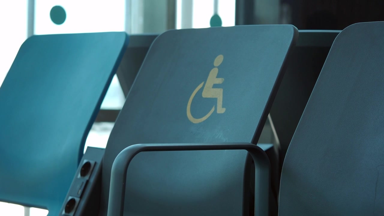Accessible Seating with Wheelchair Symbol in Public Waiting Area