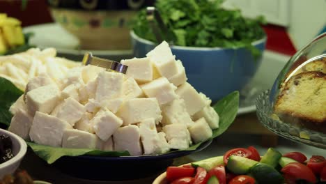 breakfast buffet with cheese and vegetables