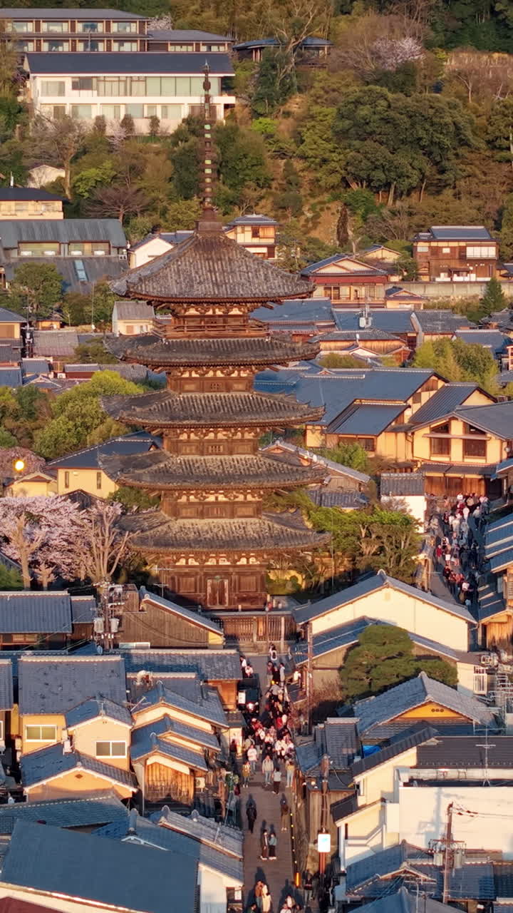 Aerial drone view of the Yasaka Pagoda temple in daylight in Kyoto, Japan