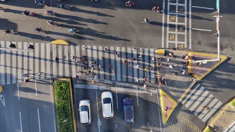 people walking on pedestrians crossing, santo domingo city in dominican republic