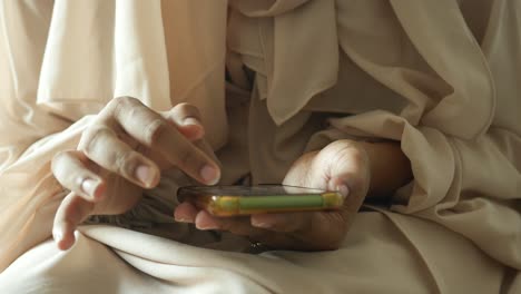 Close-up-of-women-hand-holding-smart-phone