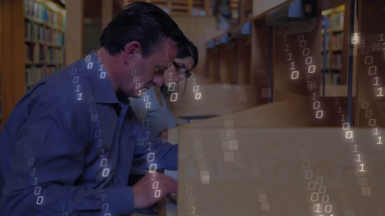 Man and woman studying at carrels, binary code streaming across desks merging study and technology