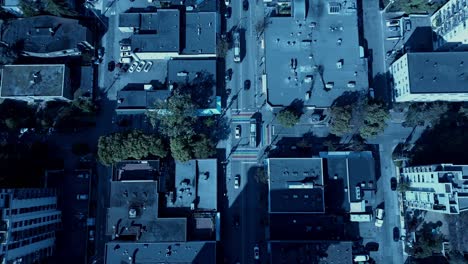 Davie-Village-aerial-drone-zoom-into-Jim-Deva-square-Bute-Street-trolley-busses-hybrid-saving-energy-people-crossing-historic-crosswalk-flag-rainbow2-2