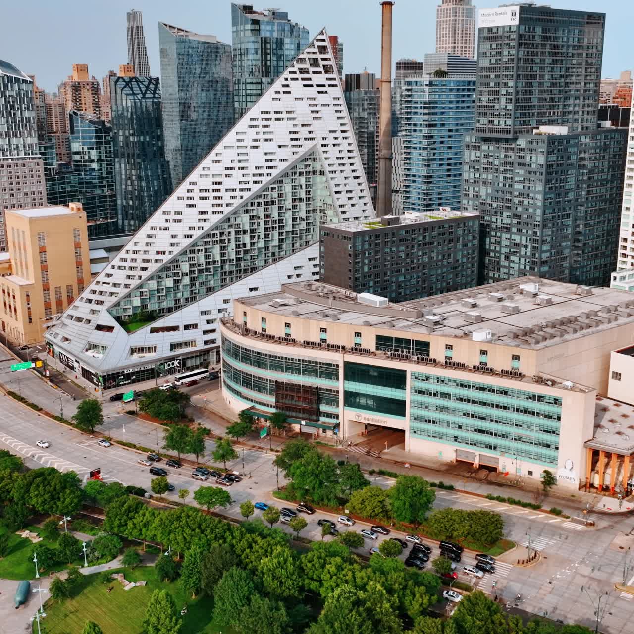 Modern futuristic architecture design in New York. Top view of Midtown near the waterfront on sunny daytime