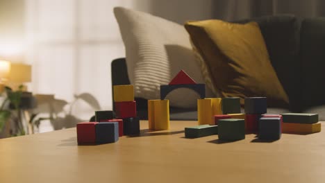 Colourful-Wooden-Building-Blocks-On-Table-At-Home-For-Learning-And-Child-Diagnosed-With-ASD-2