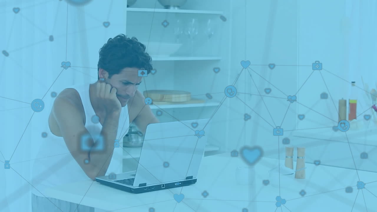 Animation of network of connections with icons over biracial man with laptop