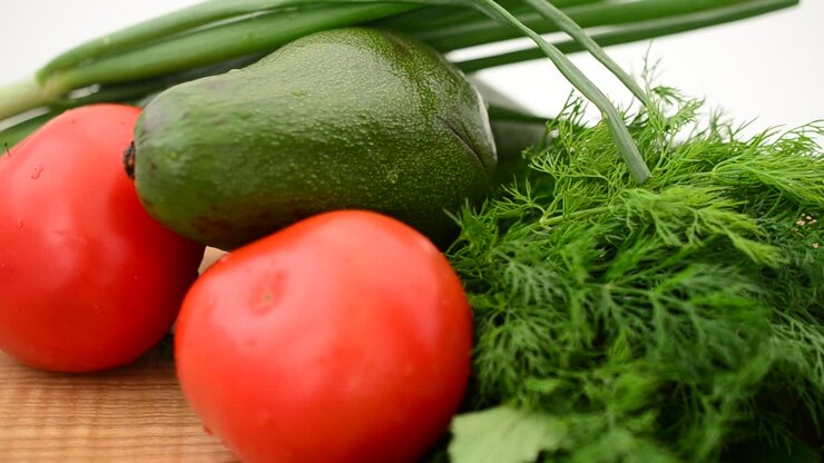 Still life from vegetables and fruit. Shooting in the movement