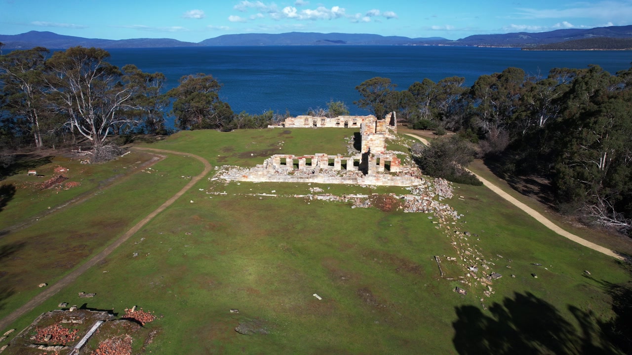 Ruins of the Coal Mines Historic Site on the Tasman Peninsula in Tasmania, Australia - pull back shot