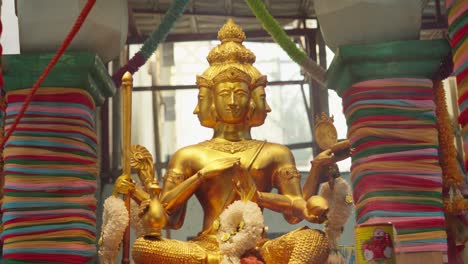 phra phrom - four-faced buddha golden sculpture