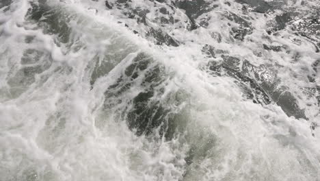 waves from the wake of a boat, slow motion