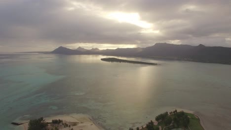 Aerial-waterscape-with-ocean-and-distant-mountains-Mauritius