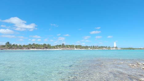 Tropical-island-shore-with-lighthouse