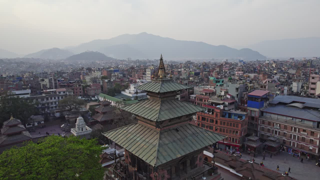 Historic Pagoda Temple Overlooking Kathmandu Cityscape with Mountains