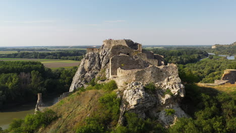 cinematic rotating drone shot of hrad devin castle in bratislava, slovakia