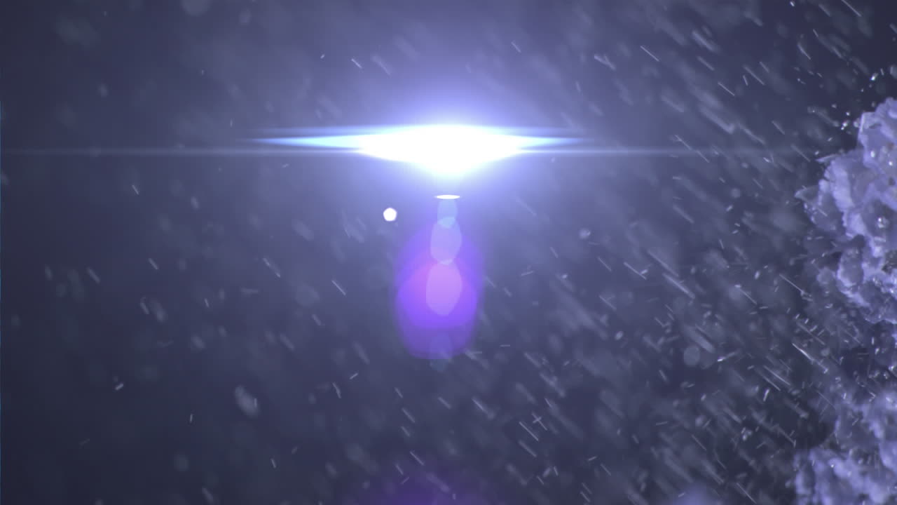 검은 바탕에 움직이는  ⁇  꽃 반점에 떨어지는 눈송이와 함께 많은 눈이 내리는 애니메이션