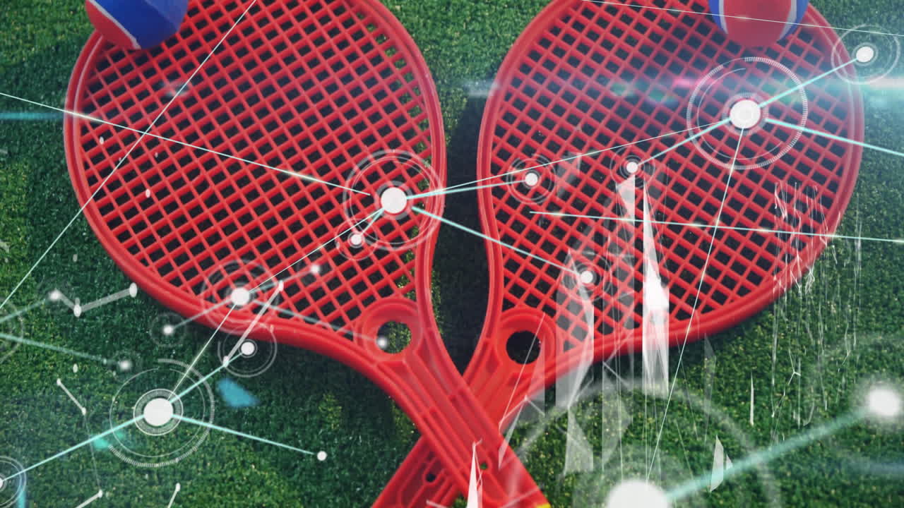 Red plastic rackets being shown crossing on green turf, with digital nodes linking across surface