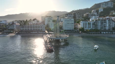 playa de los muertos beach and pier close to famous puerto vallarta malecon, the city largest public beach