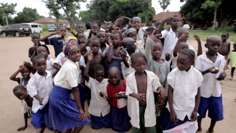 cute african school children posing for the camera in rural nigeria