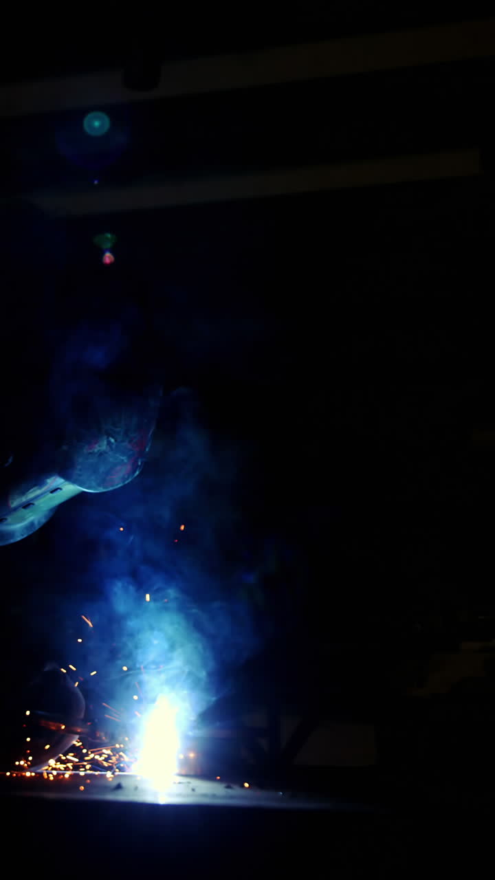 Welder working on a piece of metal